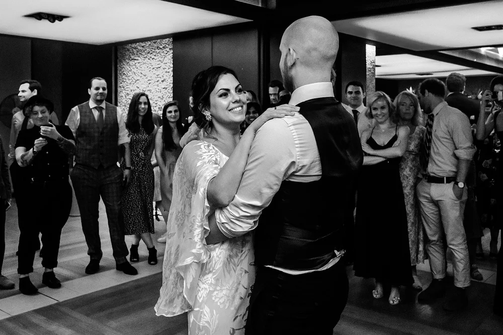 Black and white photograph of Jordan and Anna dancing together
