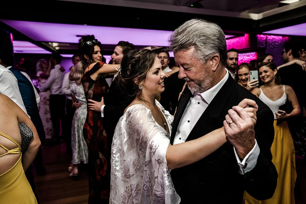 Anna dancing with a guest during the evening celebration