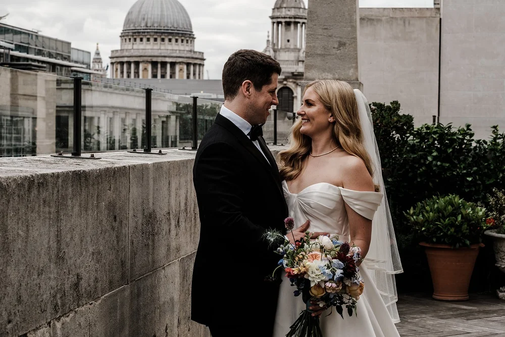Jen and Rich on the roof terrace at The Ned looking towards St Paul&rsquo;s Cathedral - 1