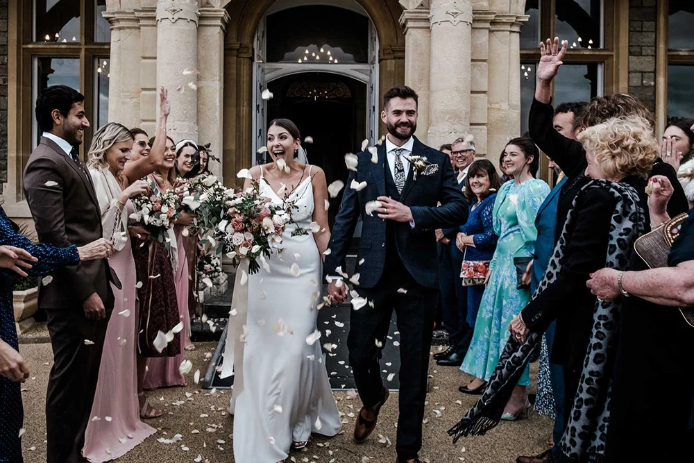 Confetti outside the front doors of Clevedon Hall after the ceremony