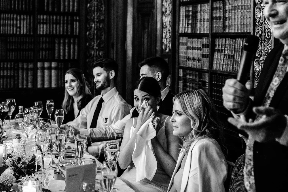 Laughter during the speeches in the library at Clevedon Hall