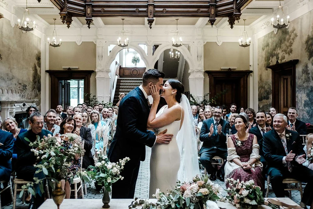 Sarah and Josh&rsquo;s first kiss as a married couple at Clevedon Hall