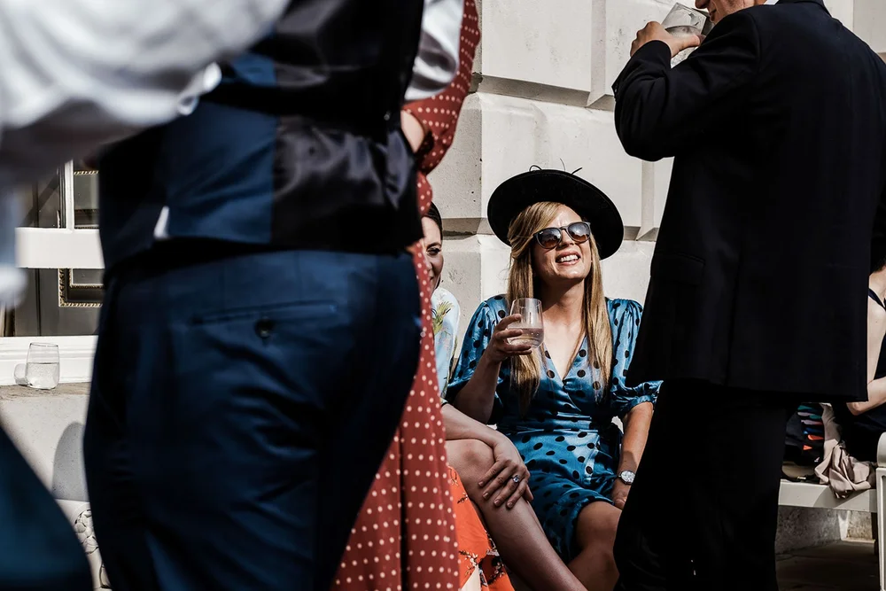 Guests with drinks in the courtyard at Middle Temple