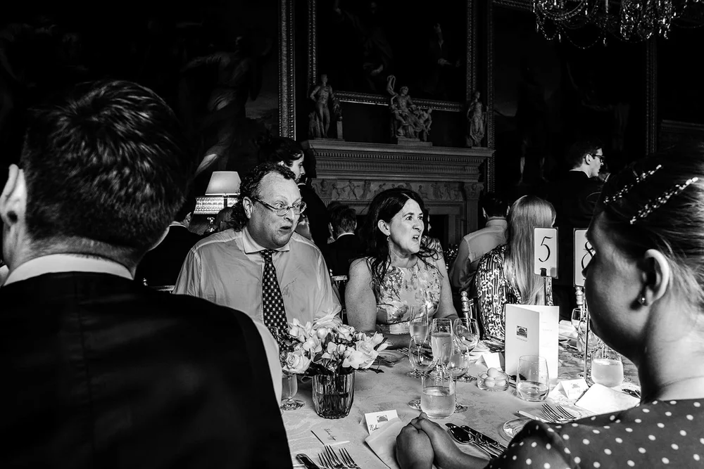 Black and white photograph of the candlelit dinner table at Spencer House