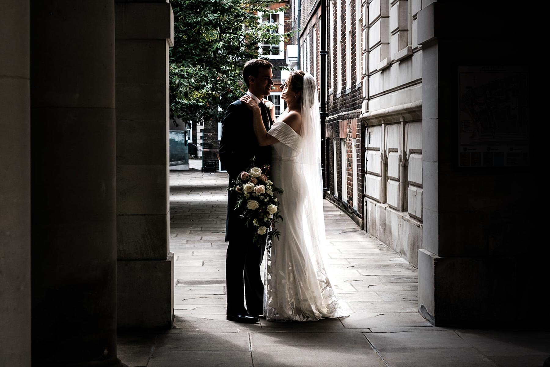 Gina and Ollie in the stone passageway at the Temple in the City of London
