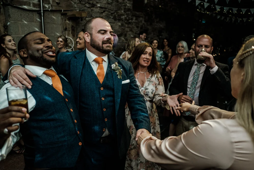 Guests celebrating together at the end of the night at Lyde Court