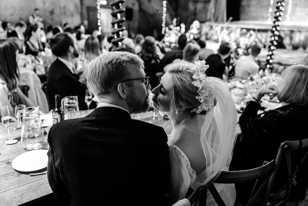 Black and white photograph of guests during dinner at Wilton&rsquo;s Music Hall