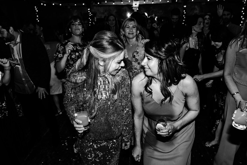 Black and white photograph of guests dancing at Wilton&rsquo;s Music Hall