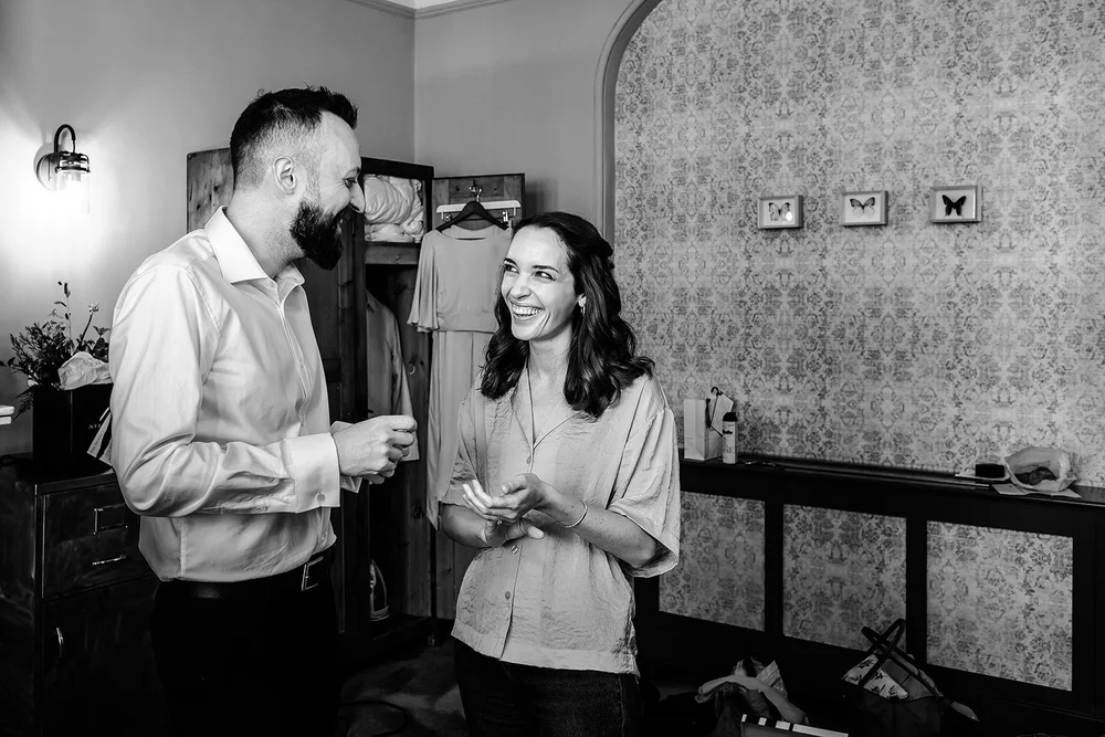 Aidan and Charlotte talking together during preparations