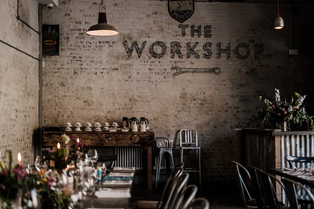 The long table set for dinner at The Workshop at the Half Moon in Herne Hill