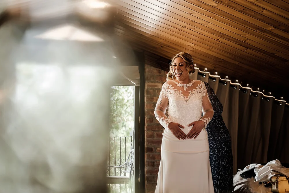 Lauren in her wedding dress before the ceremony at Willow Marsh Farm