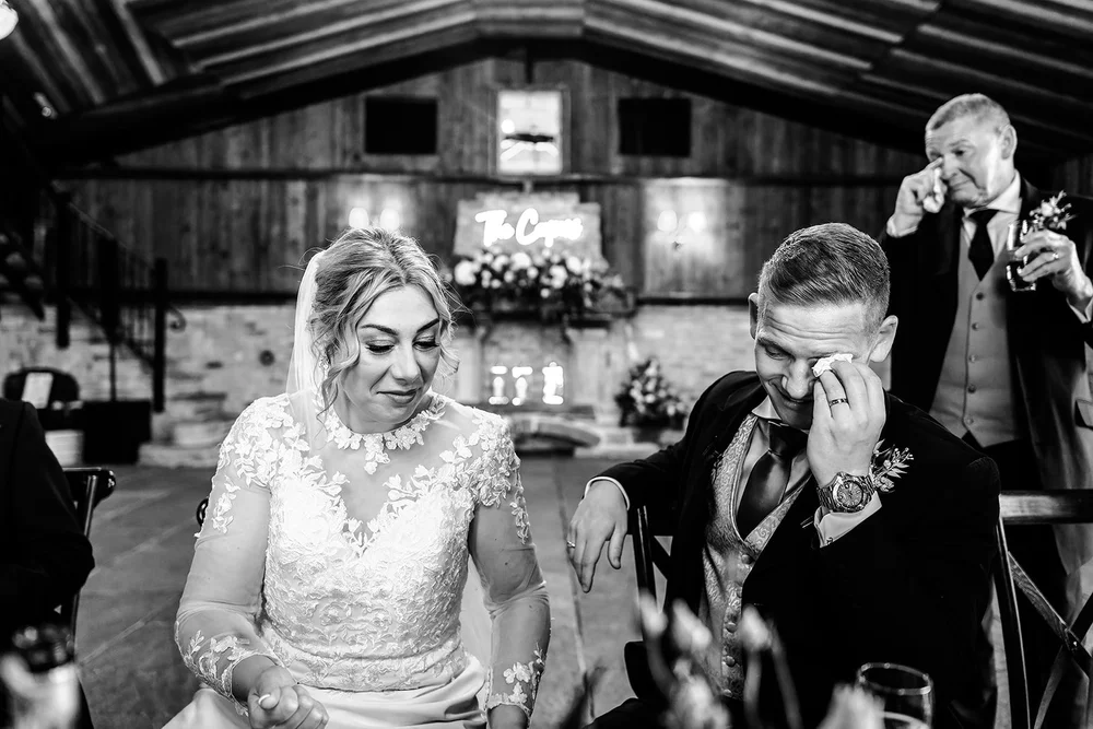 Black and white photograph of Lauren and a guest during the speeches