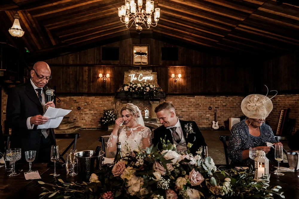 Guests listening to the speeches at the top table