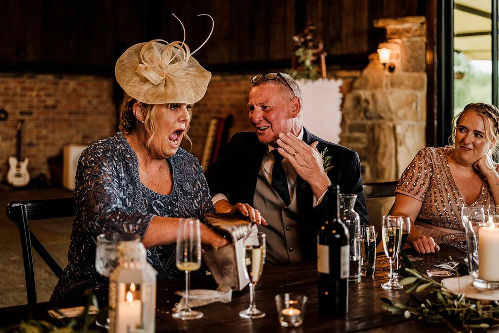 Guests laughing during the speeches at Willow Marsh Farm
