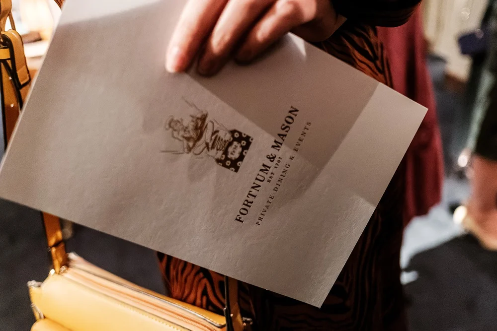A Fortnum and Mason menu card at the wedding reception