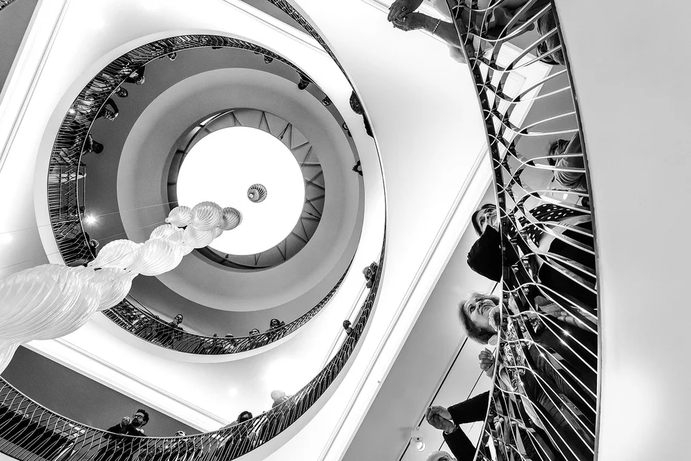 Looking down the spiral staircase at Fortnum & Mason during the wedding