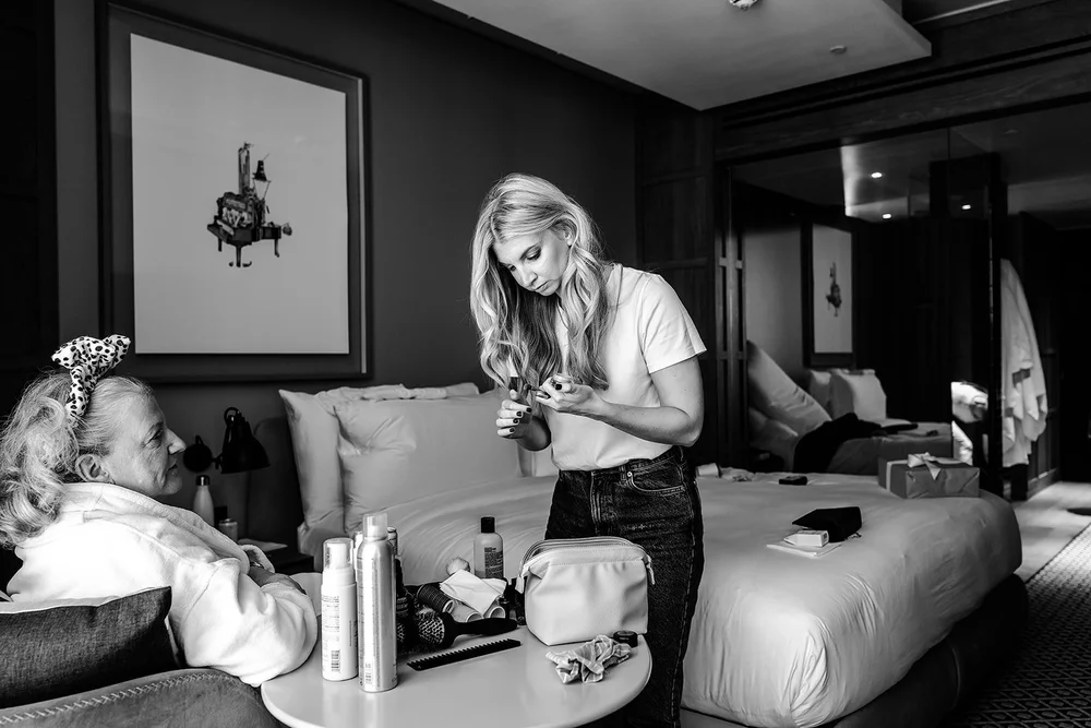 Getting ready together at The Londoner hotel before a Marylebone Town Hall wedding - 1