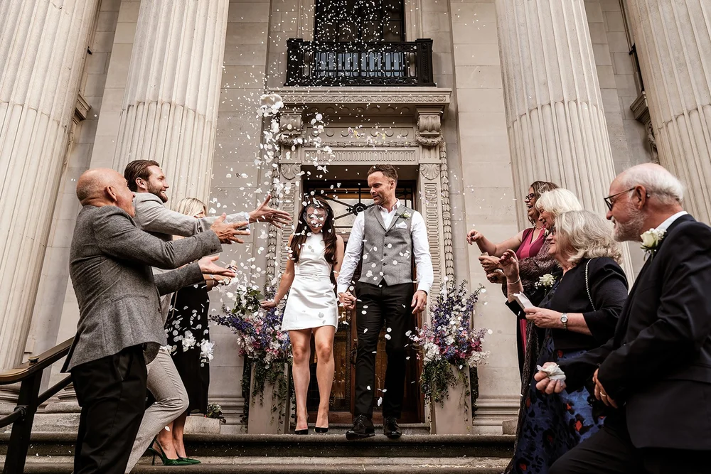 Signing the register and confetti on the steps of Old Marylebone Town Hall - 3