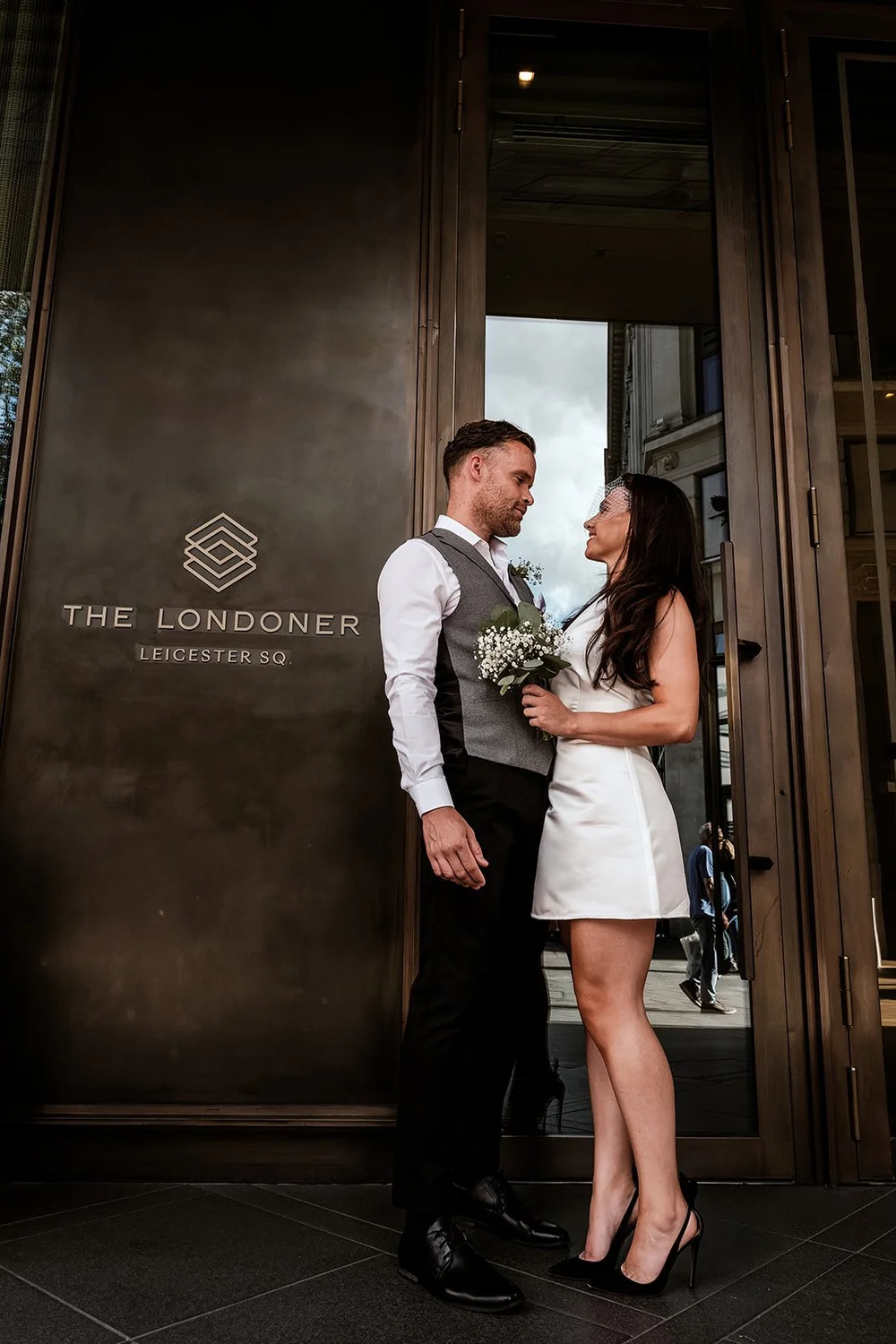 Getting ready together at The Londoner hotel before a Marylebone Town Hall wedding - 12