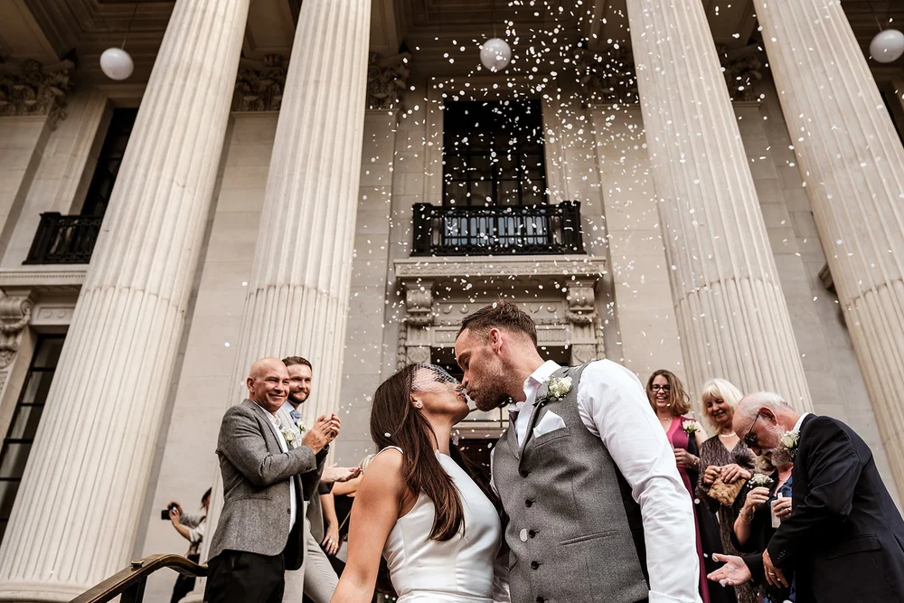 Signing the register and confetti on the steps of Old Marylebone Town Hall - 4