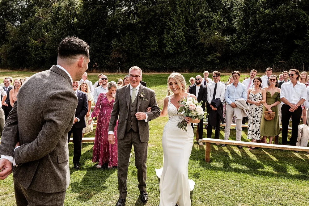 Jack waiting with the guests before the outdoor ceremony at Hadsham Farm