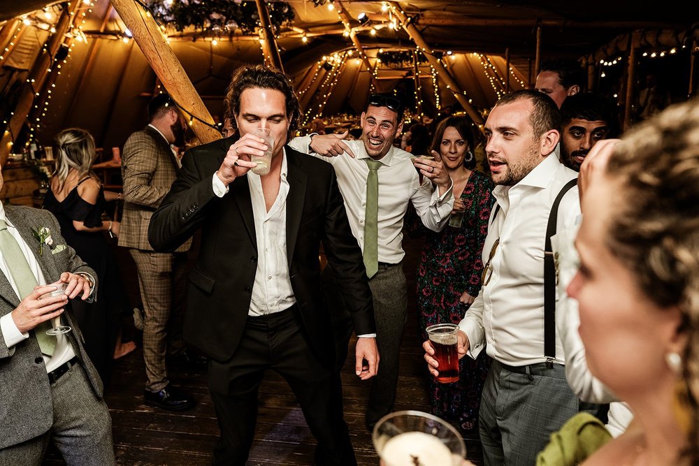 Guests celebrating on the dance floor at Hadsham Farm