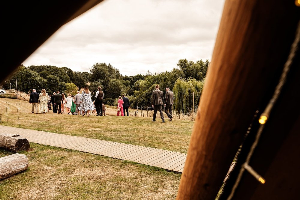 The boardwalk leading across the field to the ceremony at Hadsham Farm