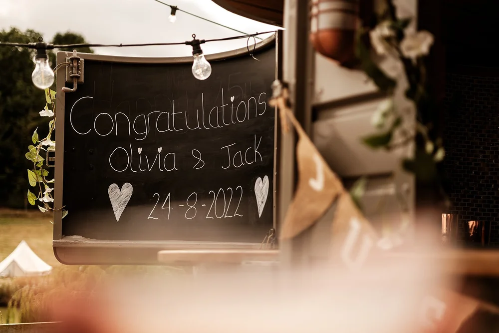 A handwritten congratulations sign at the Hadsham Farm reception