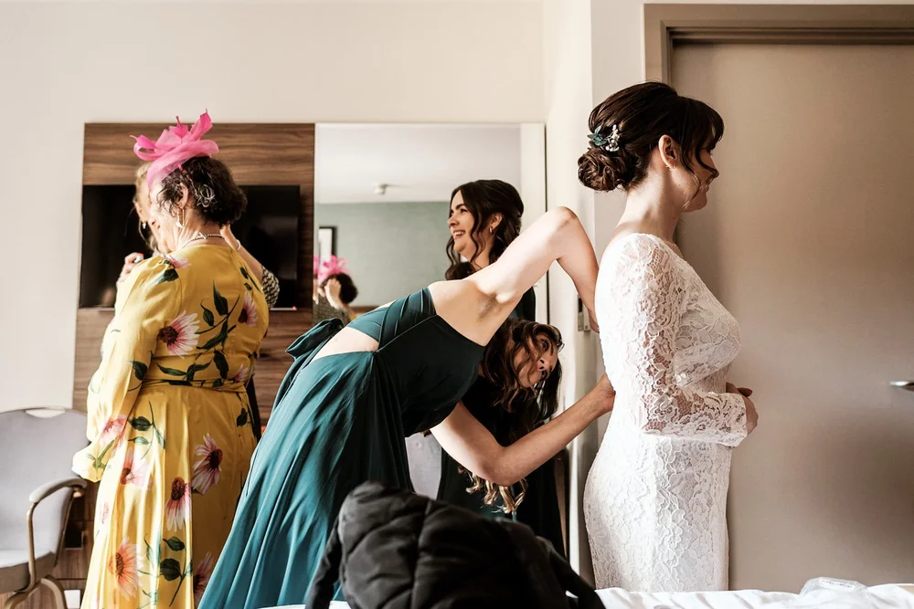 Roisin and Niall getting ready before their Screen on the Green wedding in Islington - 3