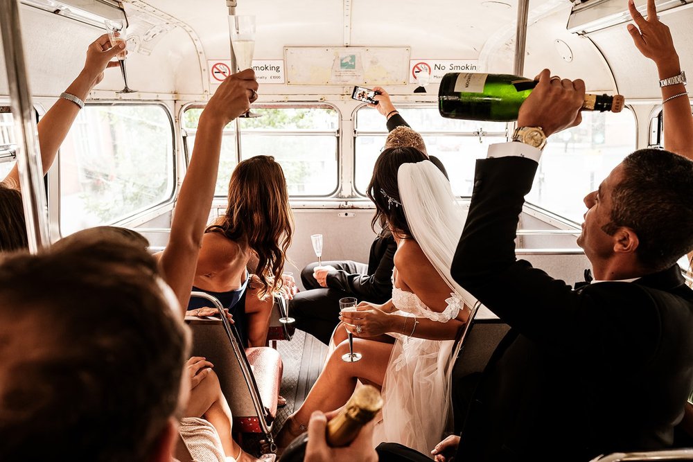 Sara and Chris and their guests on a vintage London bus travelling to Brunswick House - 2