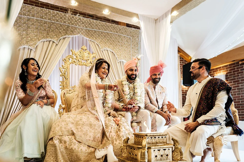 Hindu wedding ceremony in the mandap at Surrey National Golf Club - 1