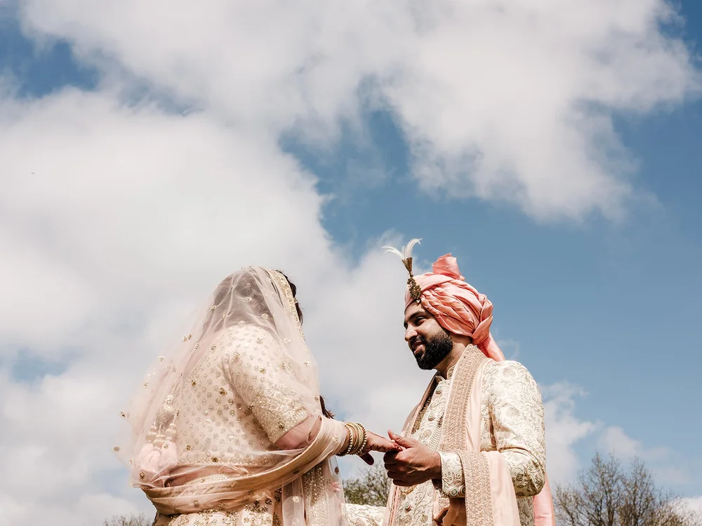 Hindu wedding ceremony in the mandap at Surrey National Golf Club - 7