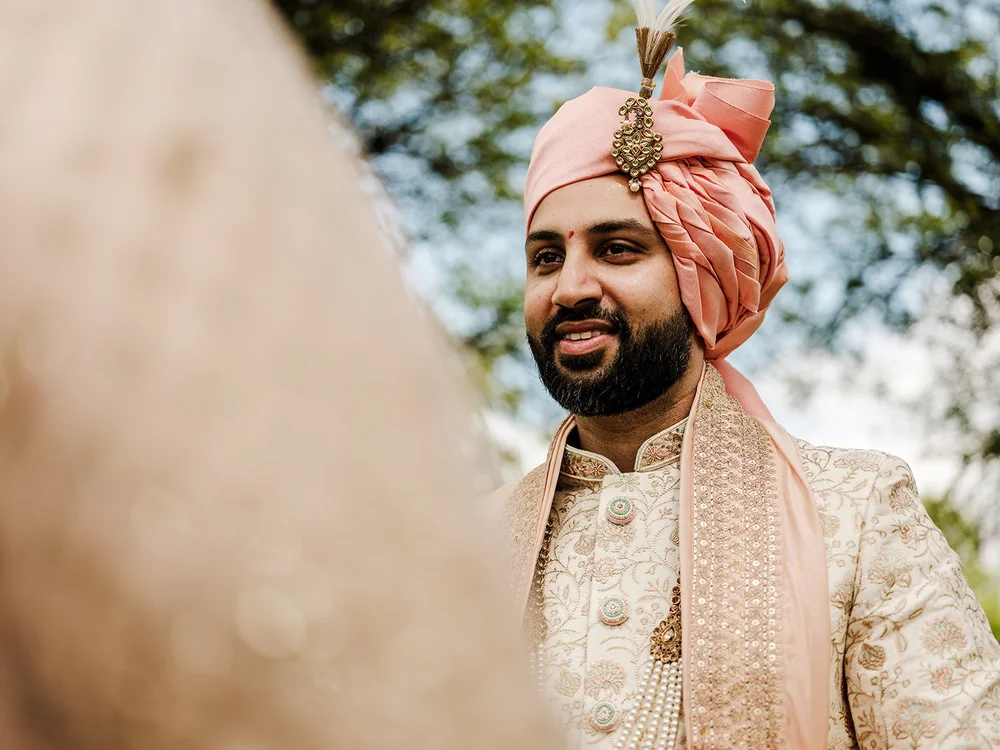Hindu wedding ceremony in the mandap at Surrey National Golf Club - 8