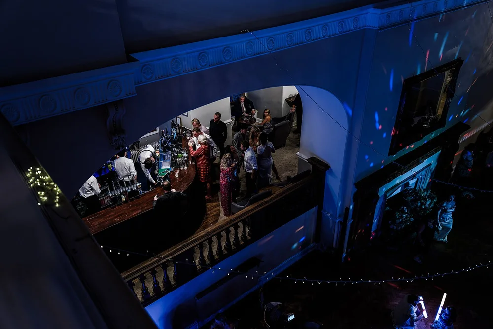 The evening reception room lit in blue at Farnham Castle