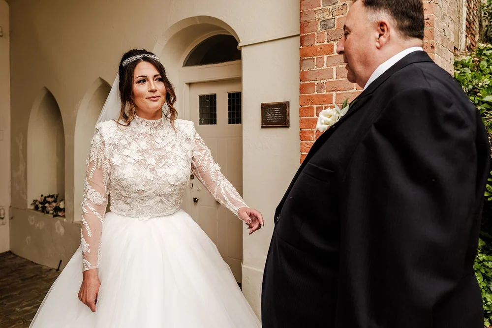 Jade turning to her father before walking into the ceremony