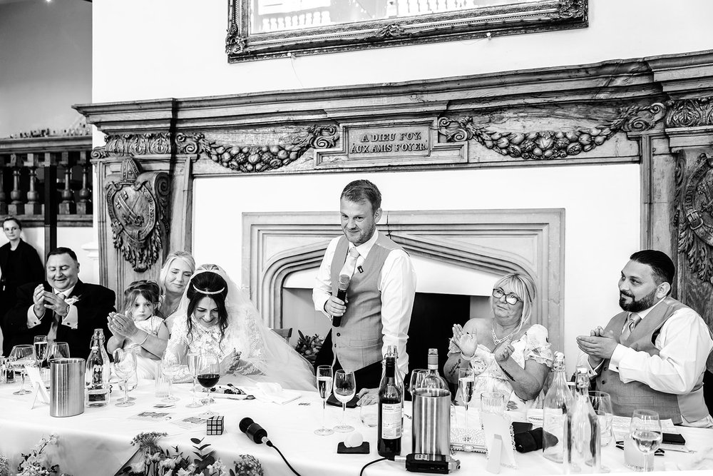 The best man giving his speech at Farnham Castle