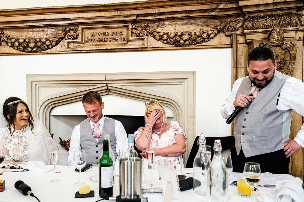 Guy giving his speech during the wedding breakfast at Farnham Castle
