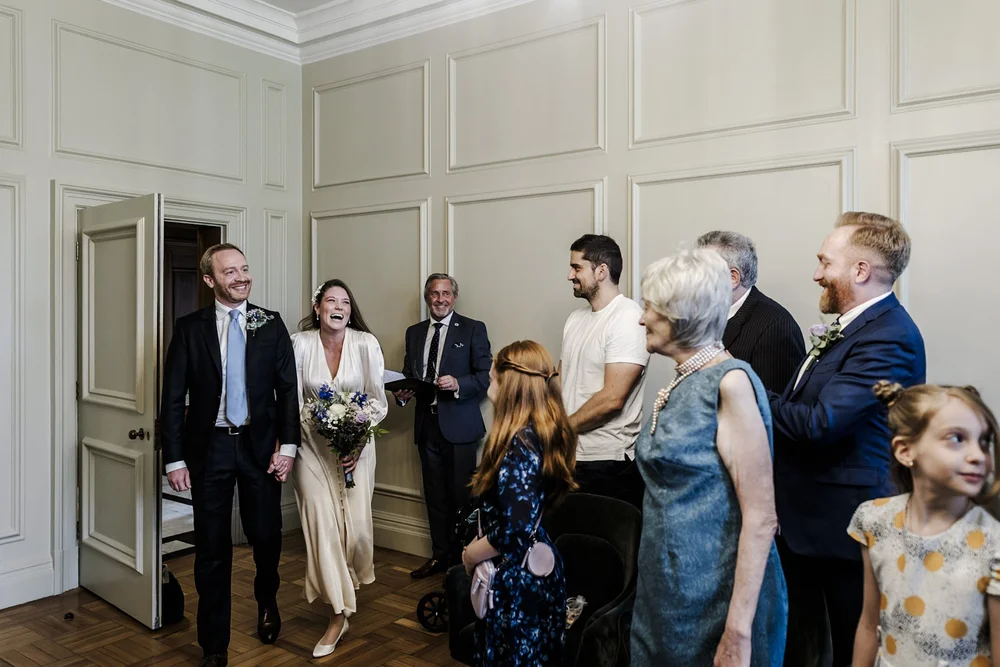 Wedding ceremony inside Old Marylebone Town Hall, documentary photography by Oliver Holder - 3