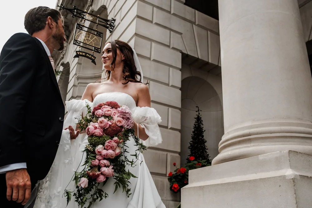 Wedding confetti moment outside The Ned Hotel City of London
