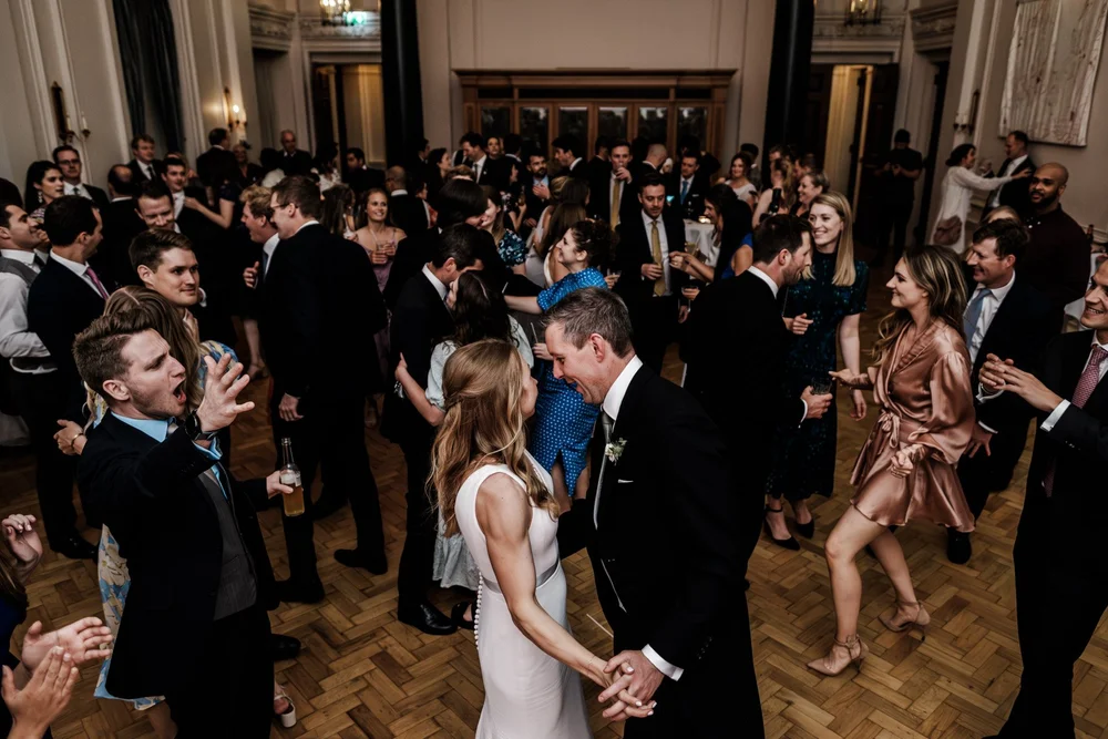 Wedding guests dancing at The Ned Hotel City of London