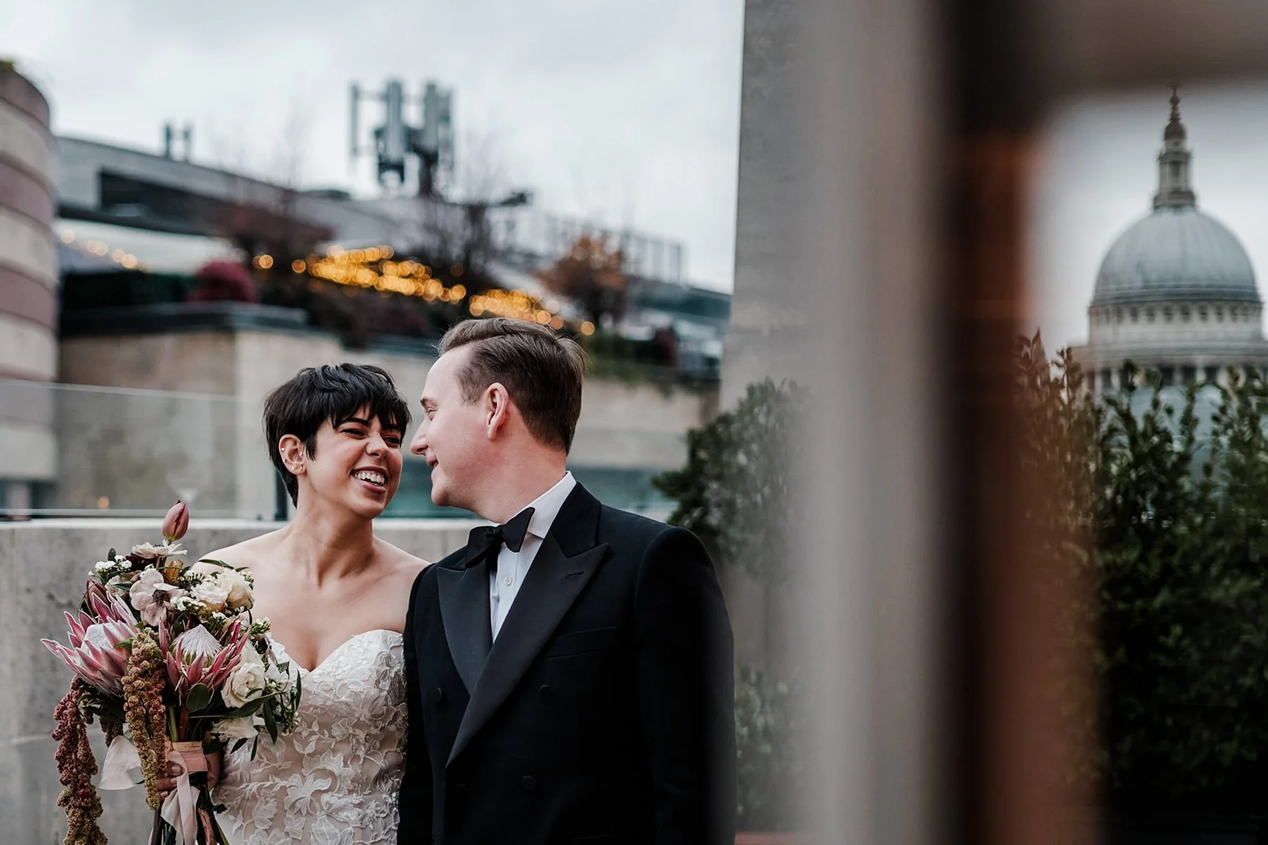 Guests cheering as a couple are married at The Ned Hotel in the City of London