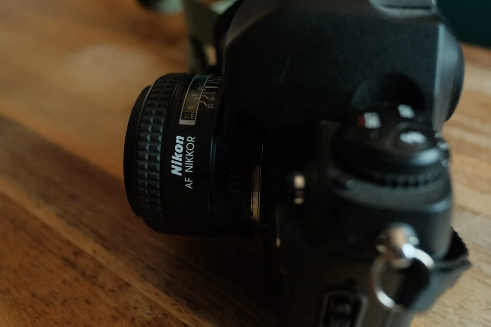 Close-up of the manual controls on a 35mm film camera