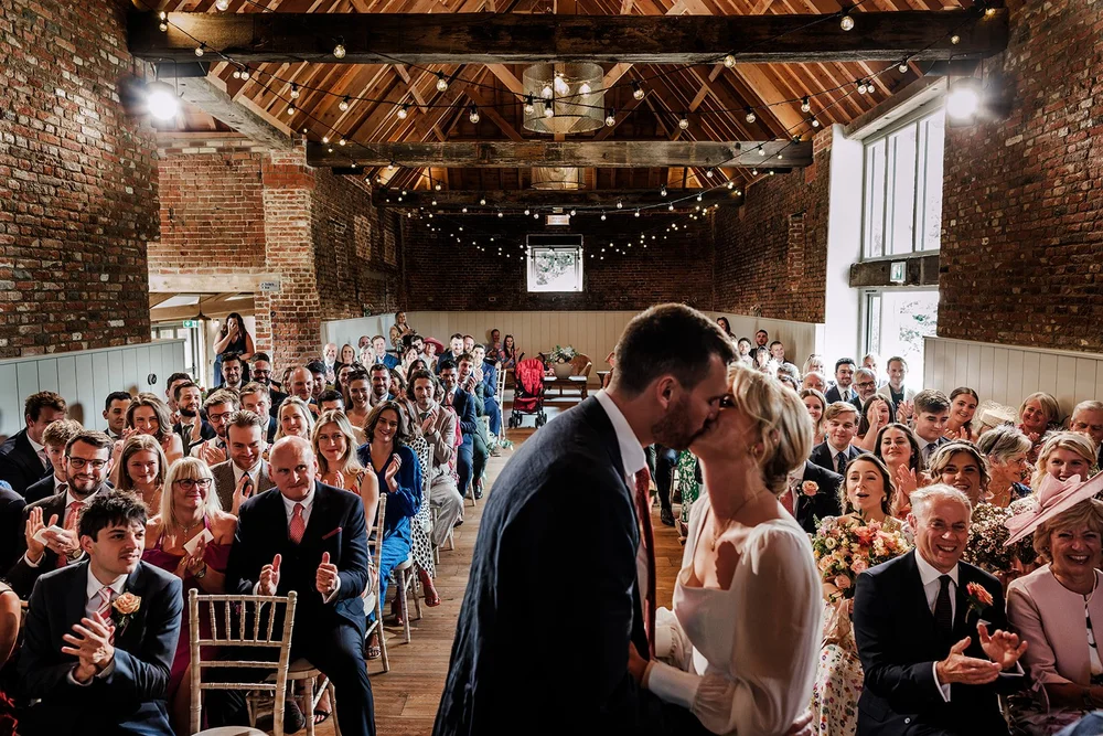 Wedding ceremony in the restored thatched barn at the Worstead Estate - 3