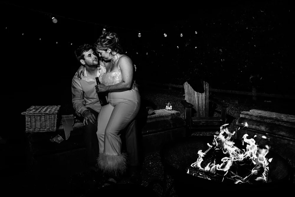 Rose and Frankie by the fire pit at the end of the night at Elmley