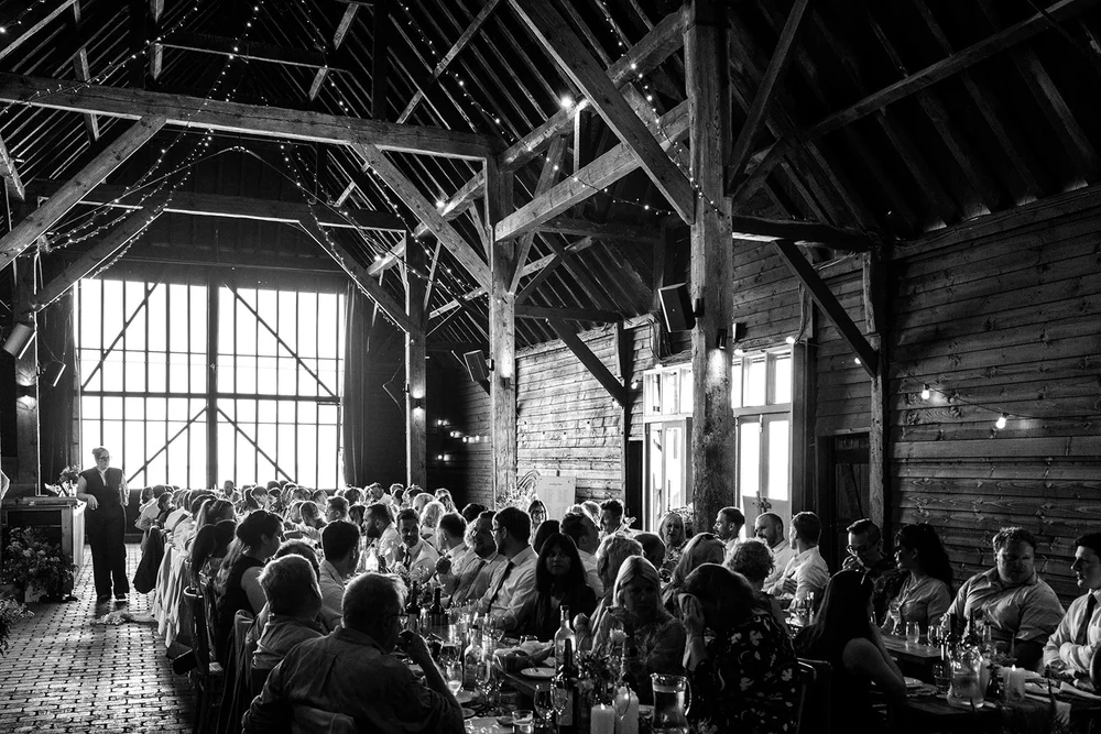 The wedding breakfast under the rafters of the barn at Elmley Nature Reserve
