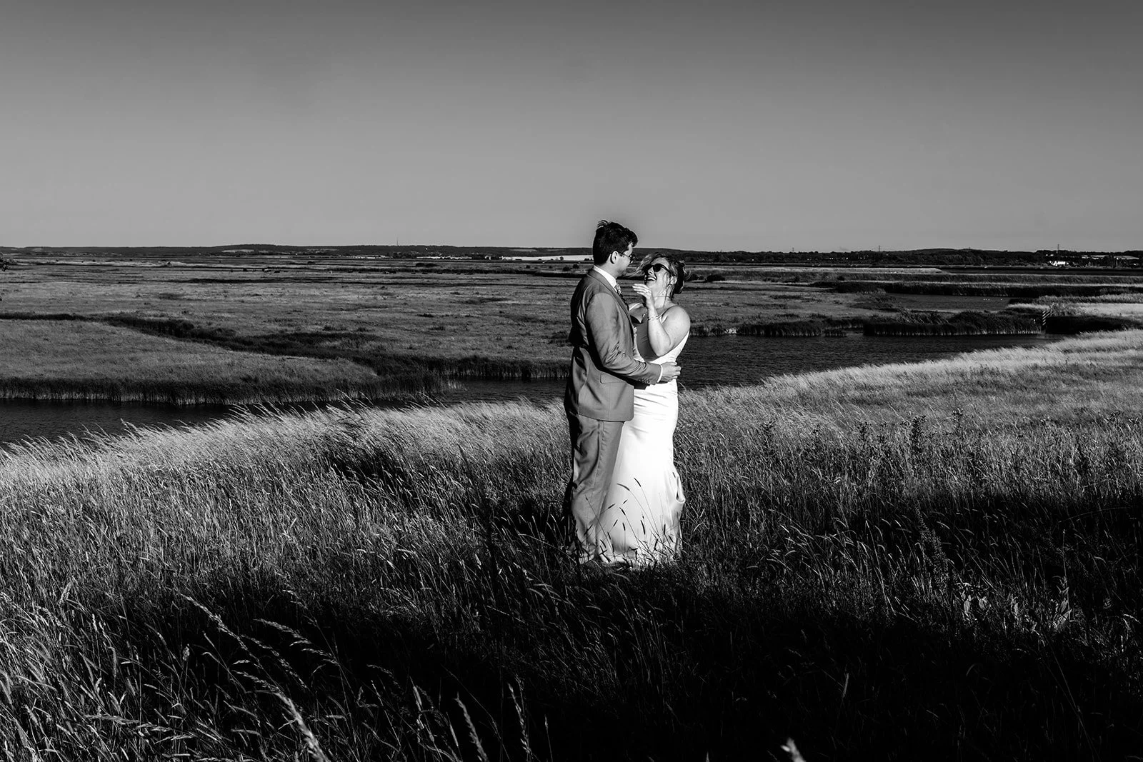 Rose and Frankie in the long marsh grass at Elmley Nature Reserve