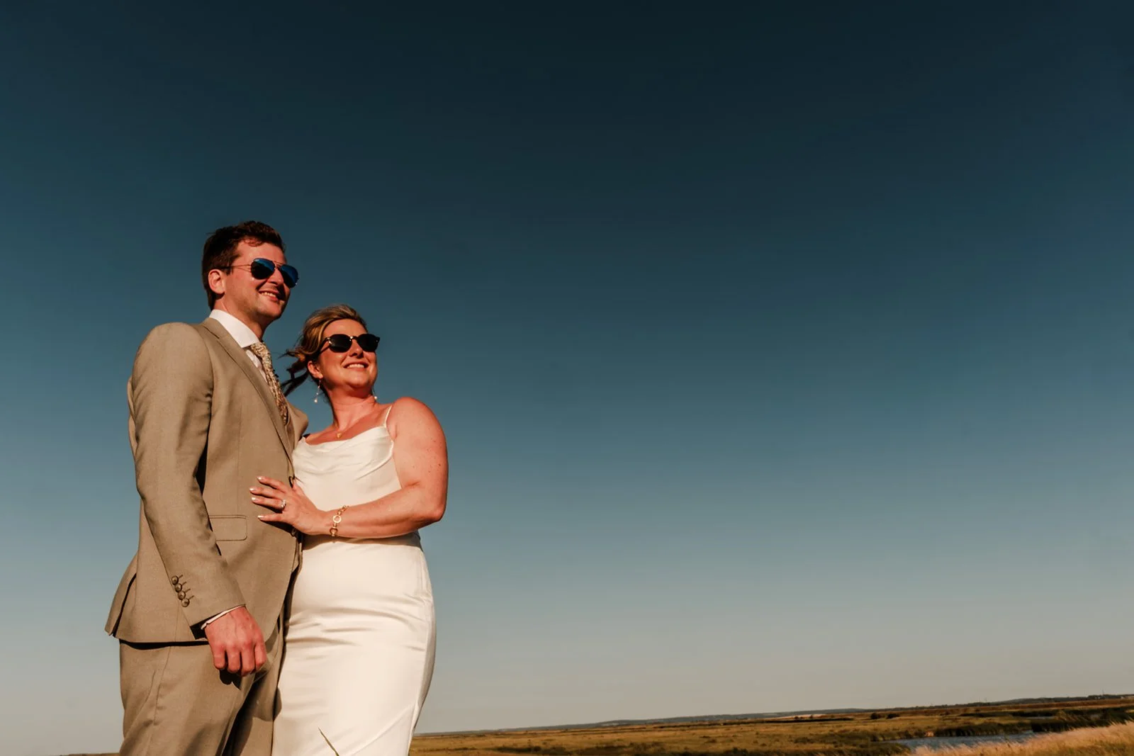 Wide landscape portrait of Rose and Frankie at Elmley Nature Reserve