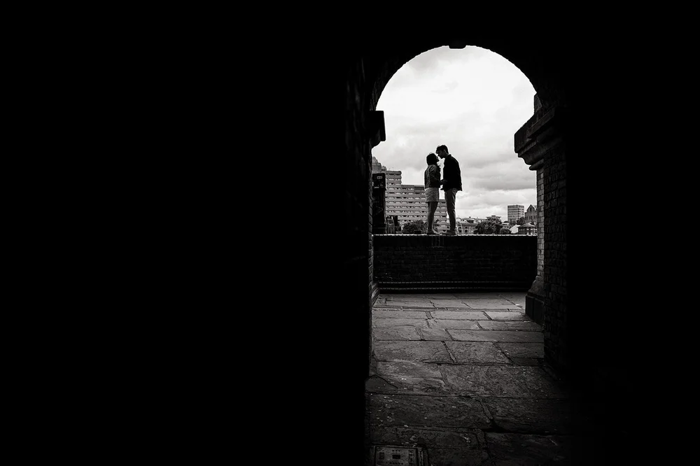 Candid photograph moments after a Tower Bridge proposal in London