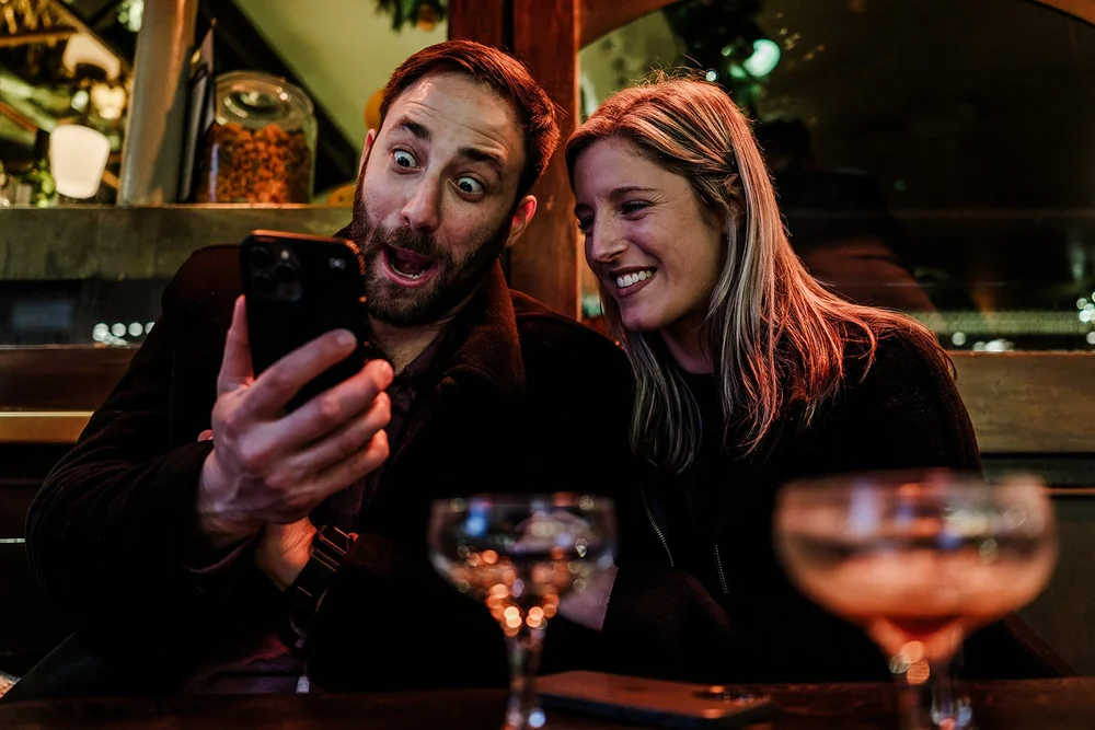 The moment of a surprise marriage proposal photographed candidly in the UK