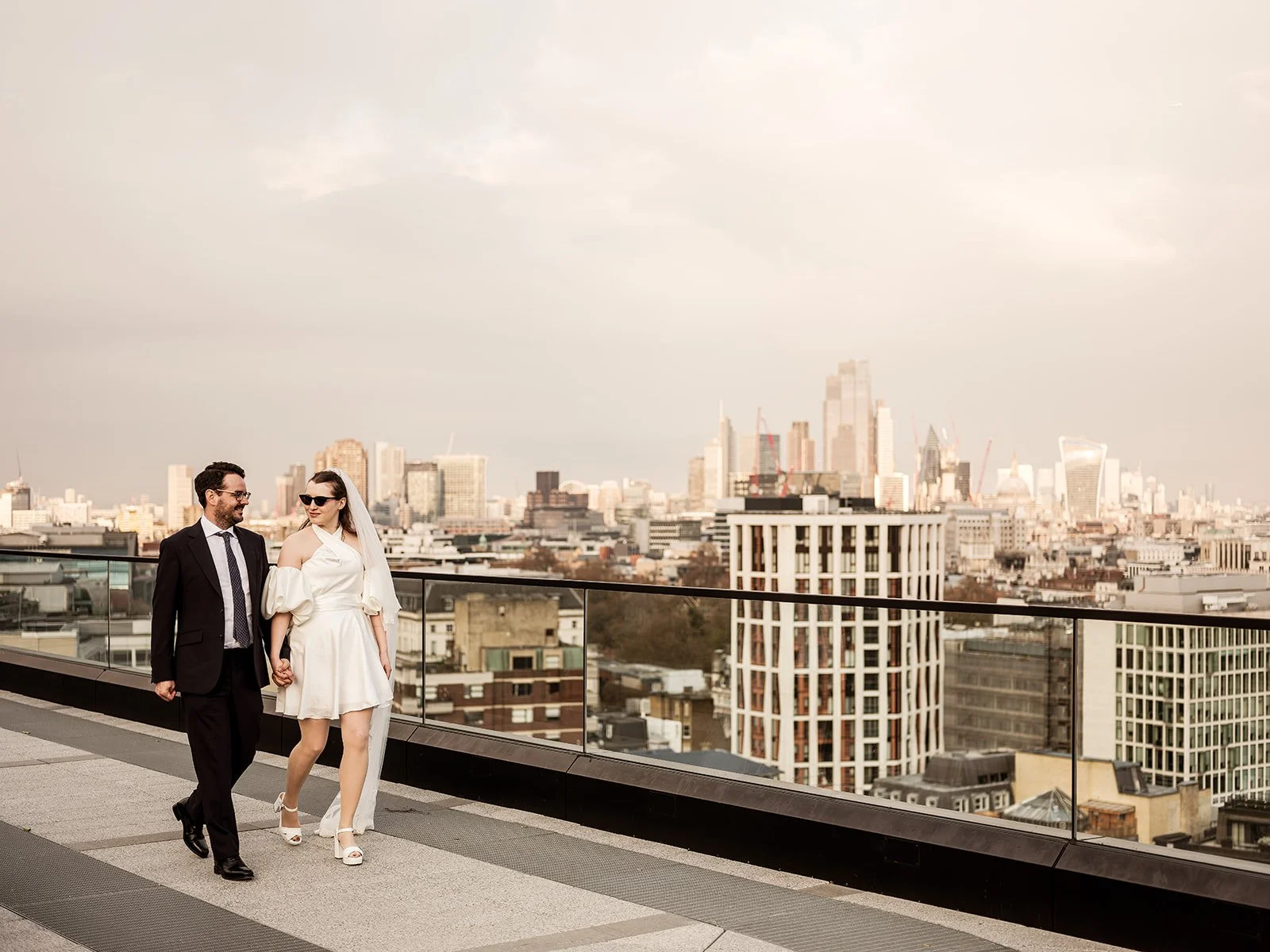 Helen and Benoit on the rooftop terrace above London on their wedding day